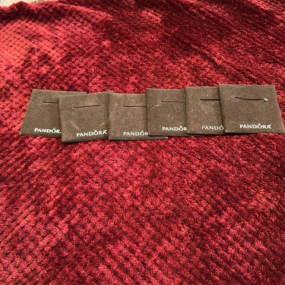 Set of 6 brown velvet-like Pandora Jewelry display pads.
